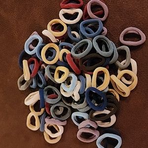 Lot of 100 small pony tail holders